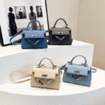 Fashion Platinum Kelly Bag Women's 2024 Spring New PU Handheld Foreign Style Crossbody Bag Premium Small Square Bag